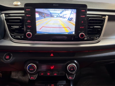 2018 Kia Rio 4 pts. EX, TM6, a/ac. Aut., VE, f. niebla, RA-15 (línea nueva)