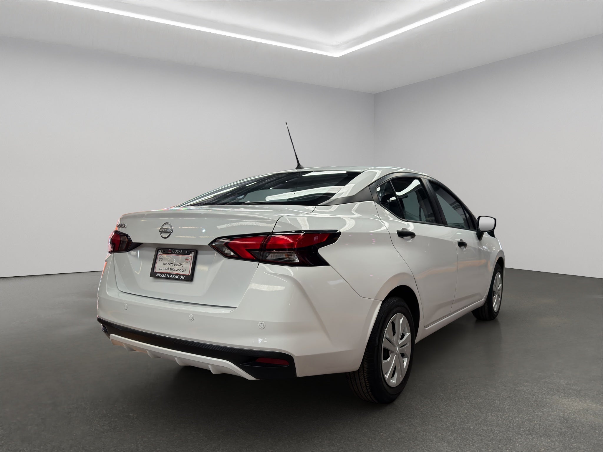 2024 Nissan Versa 4 pts. Sense, TM5, a/ac., R-15
