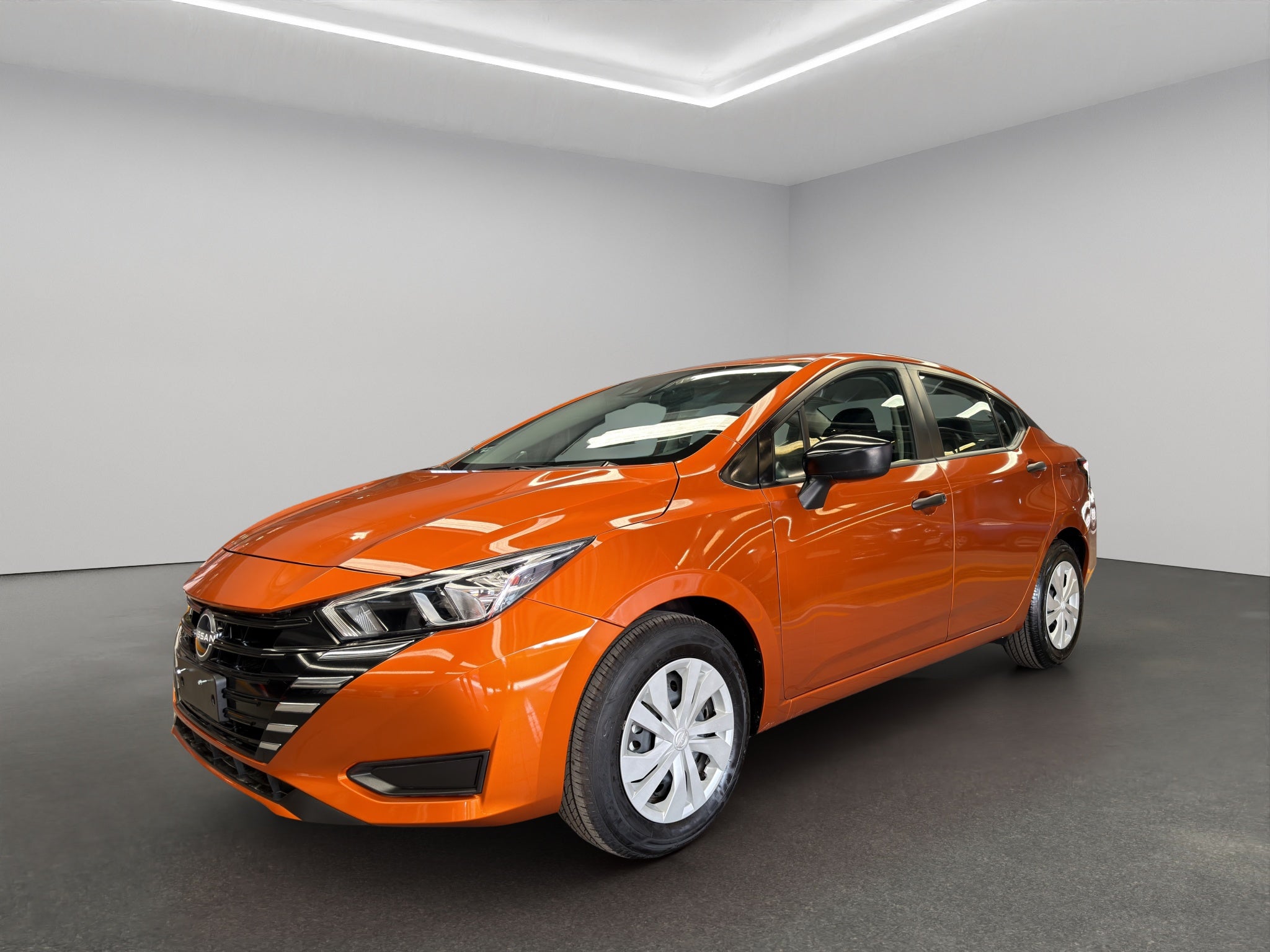 2024 Nissan Versa 4 pts. Sense, TM5, a/ac., R-15