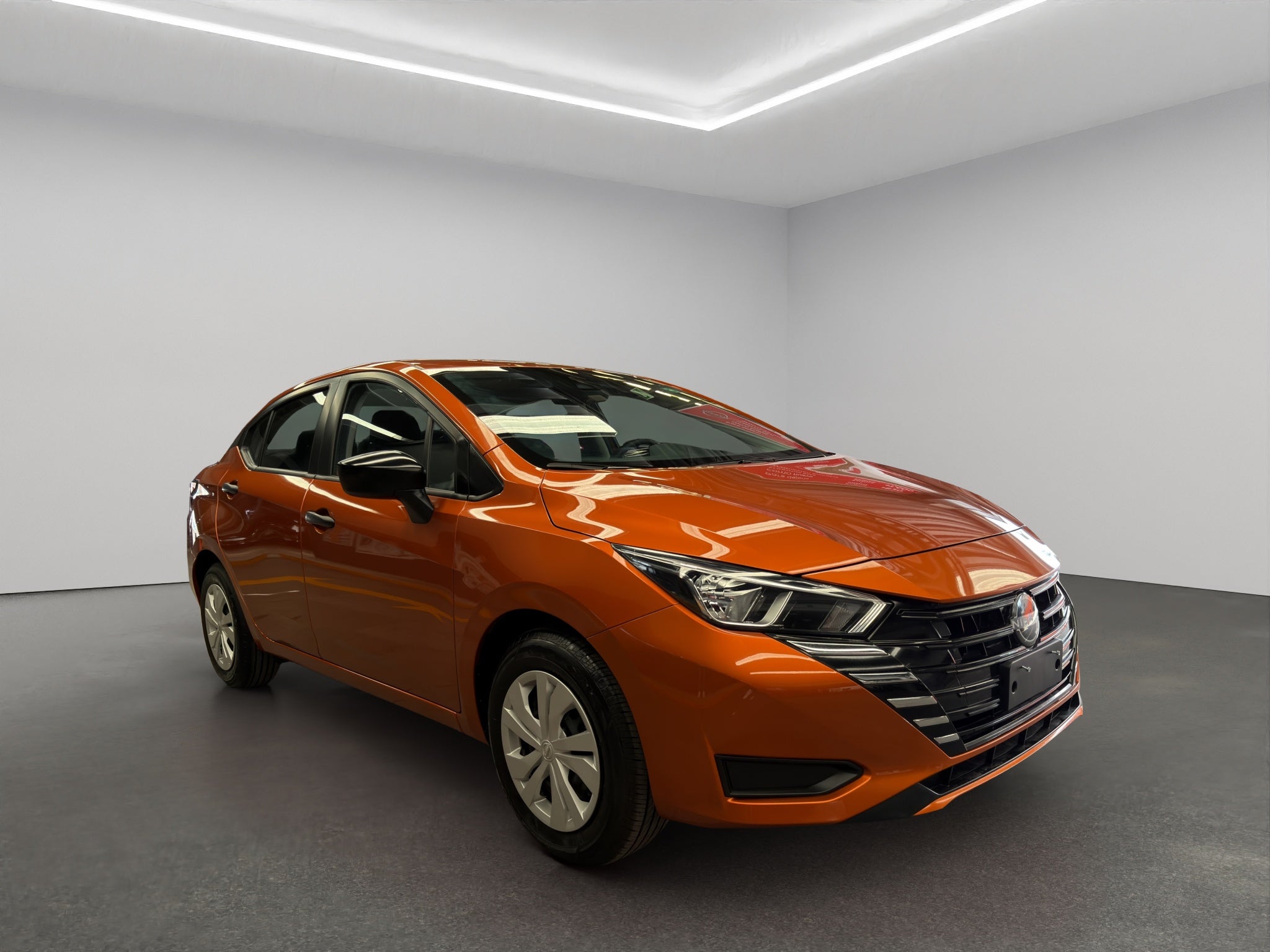 2024 Nissan Versa 4 pts. Sense, TM5, a/ac., R-15