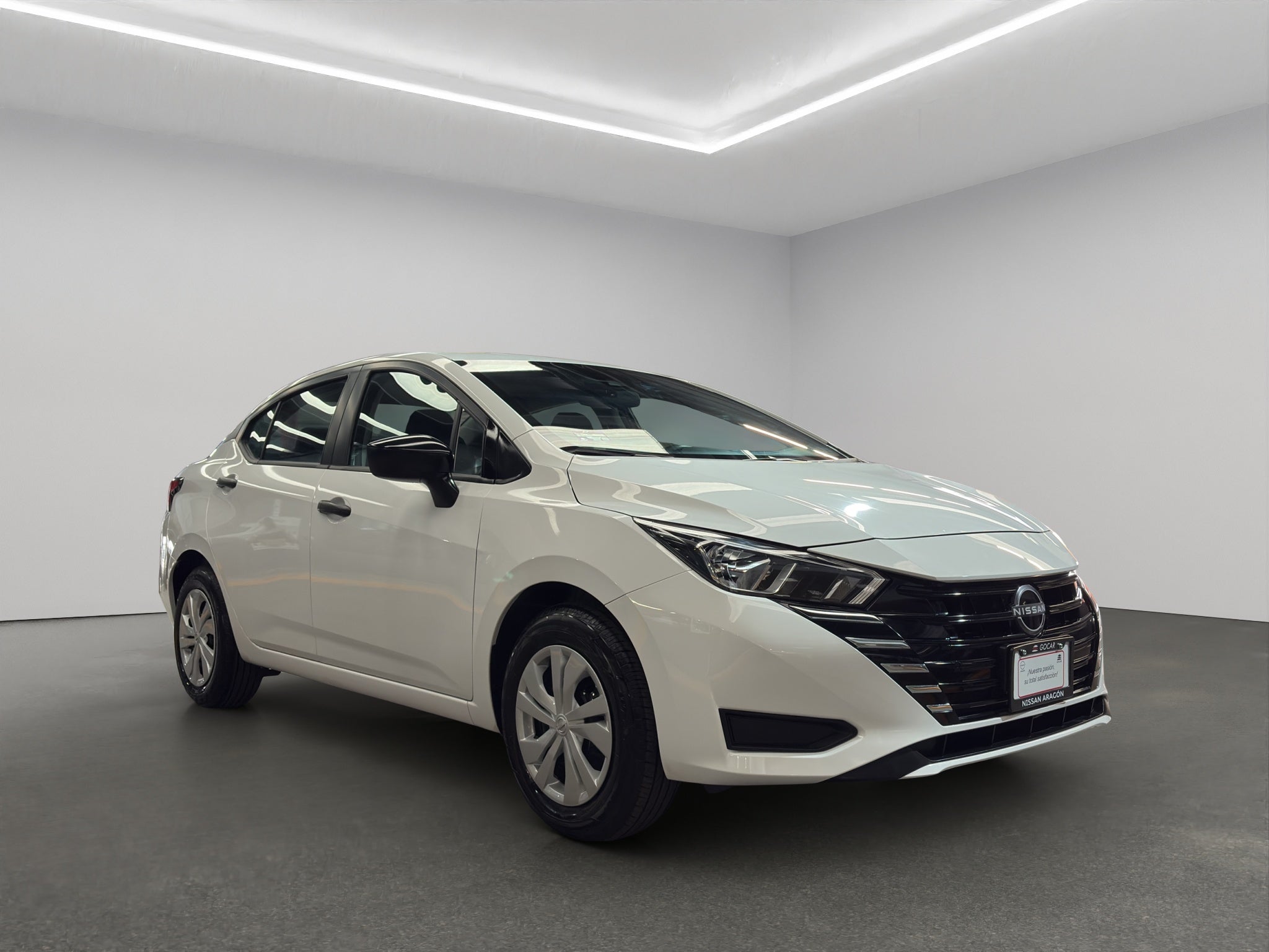 2024 Nissan Versa 4 pts. Sense, TM5, a/ac., R-15