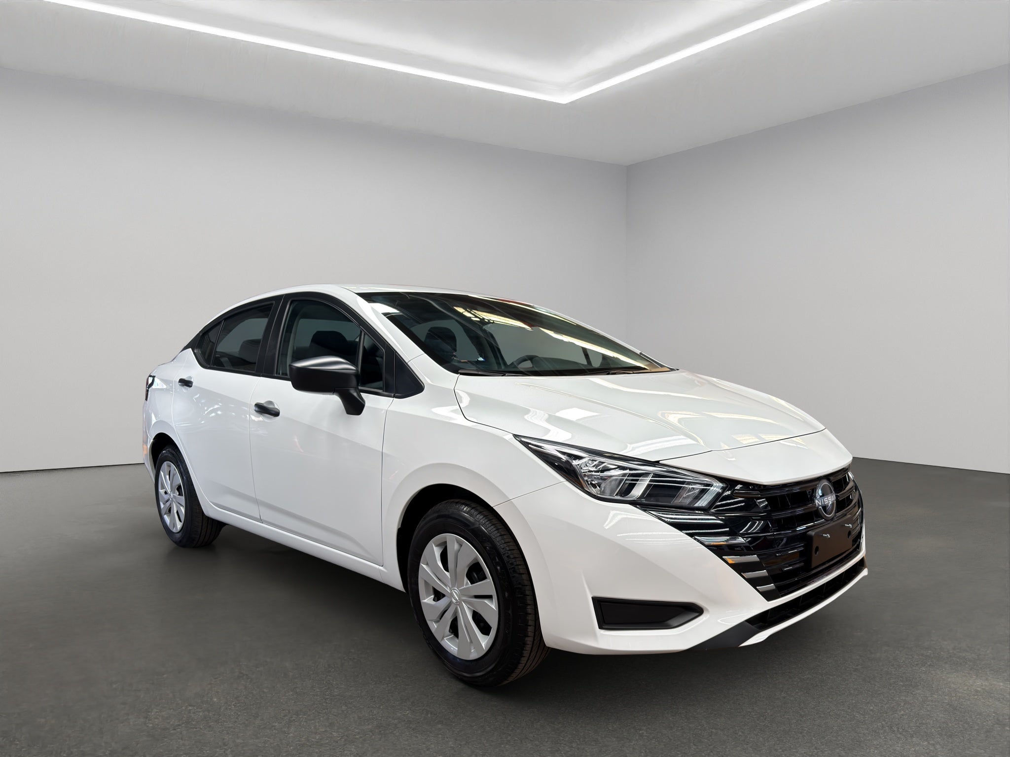 2024 Nissan Versa 4 pts. Sense, TM5, a/ac., R-15