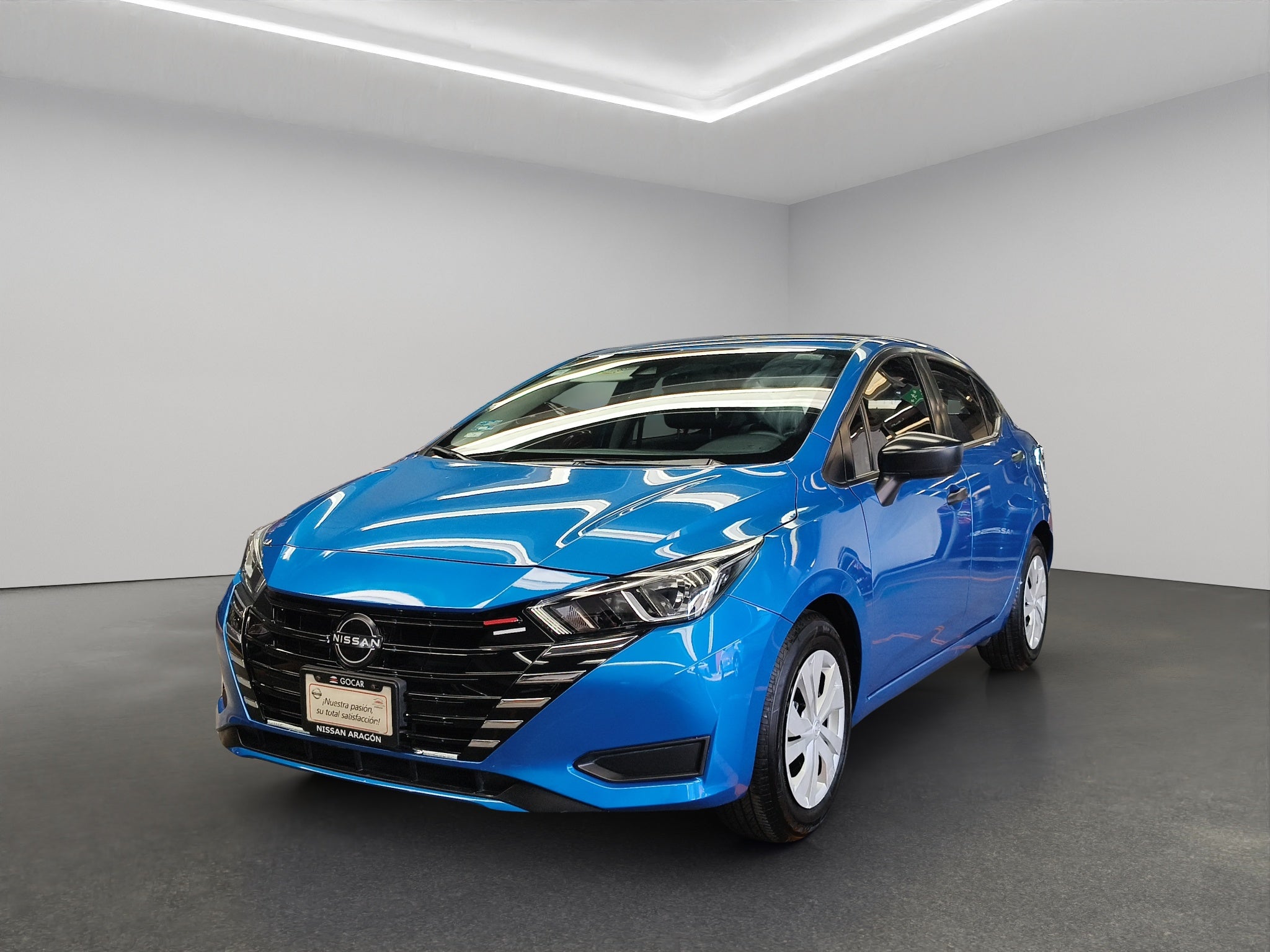 2024 Nissan Versa 4 pts. Sense, TM5, a/ac., R-15