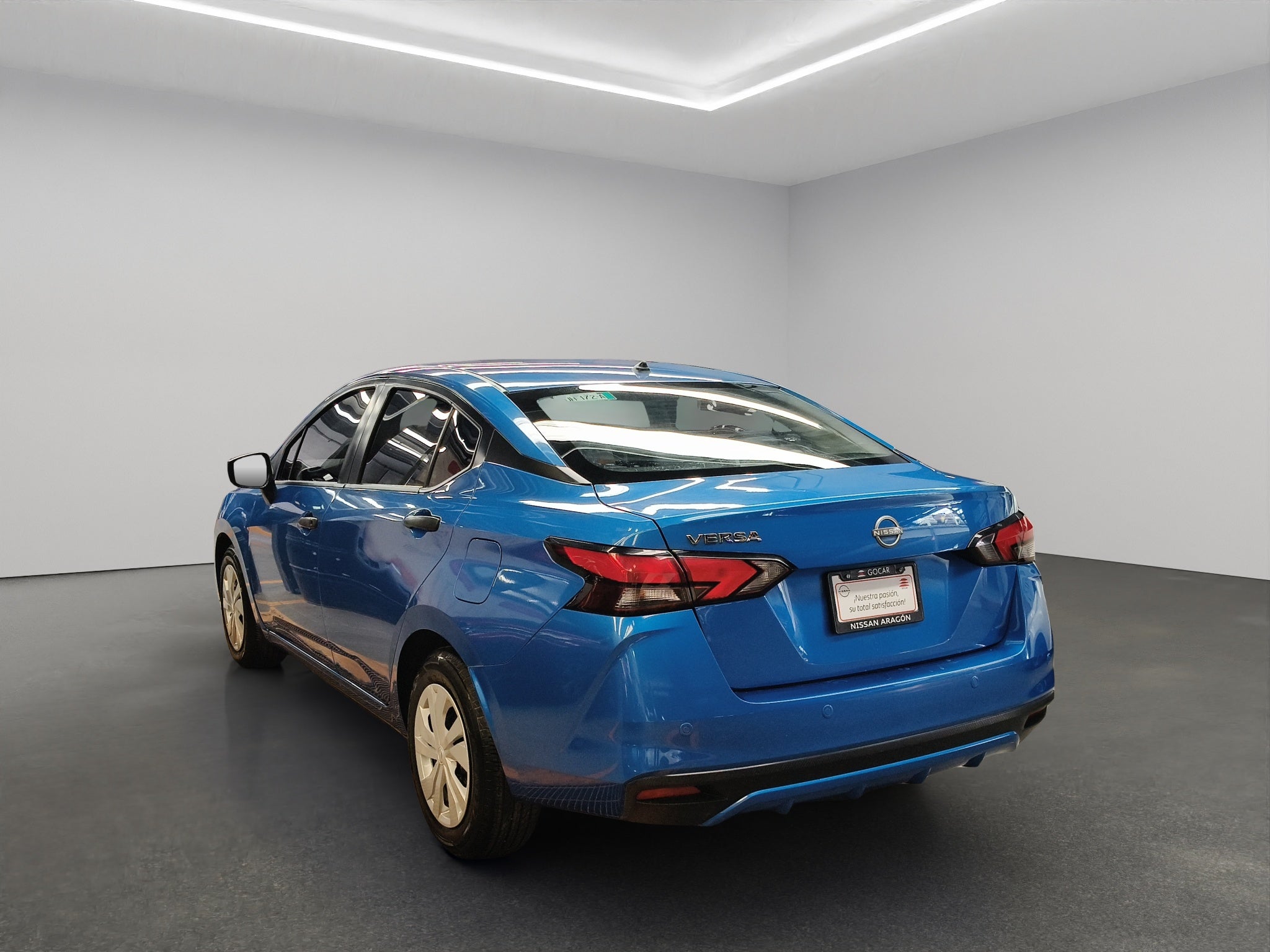 2024 Nissan Versa 4 pts. Sense, TM5, a/ac., R-15