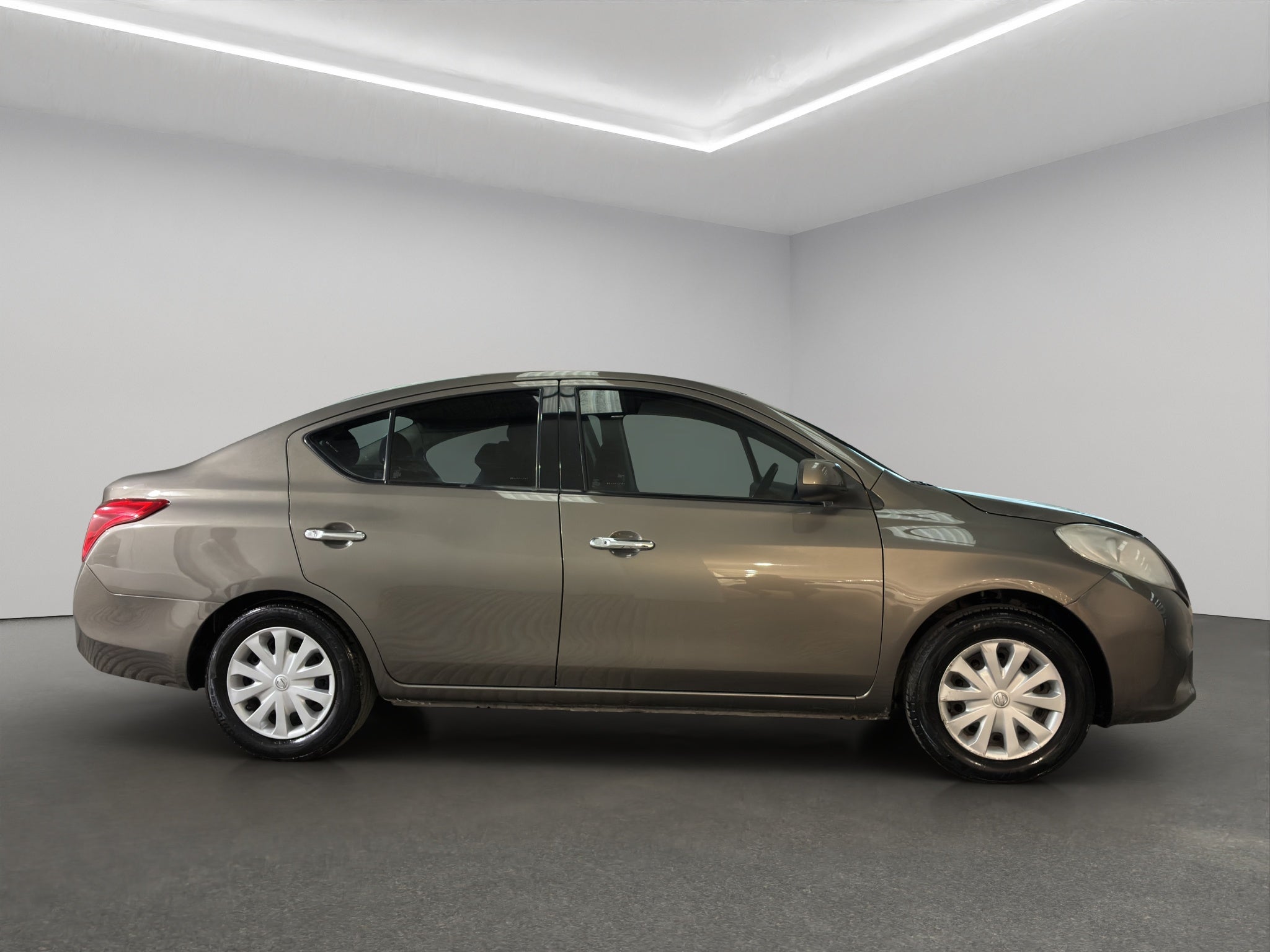 2015 Nissan Versa 4 pts. Sense, TM5, a/ac., VE