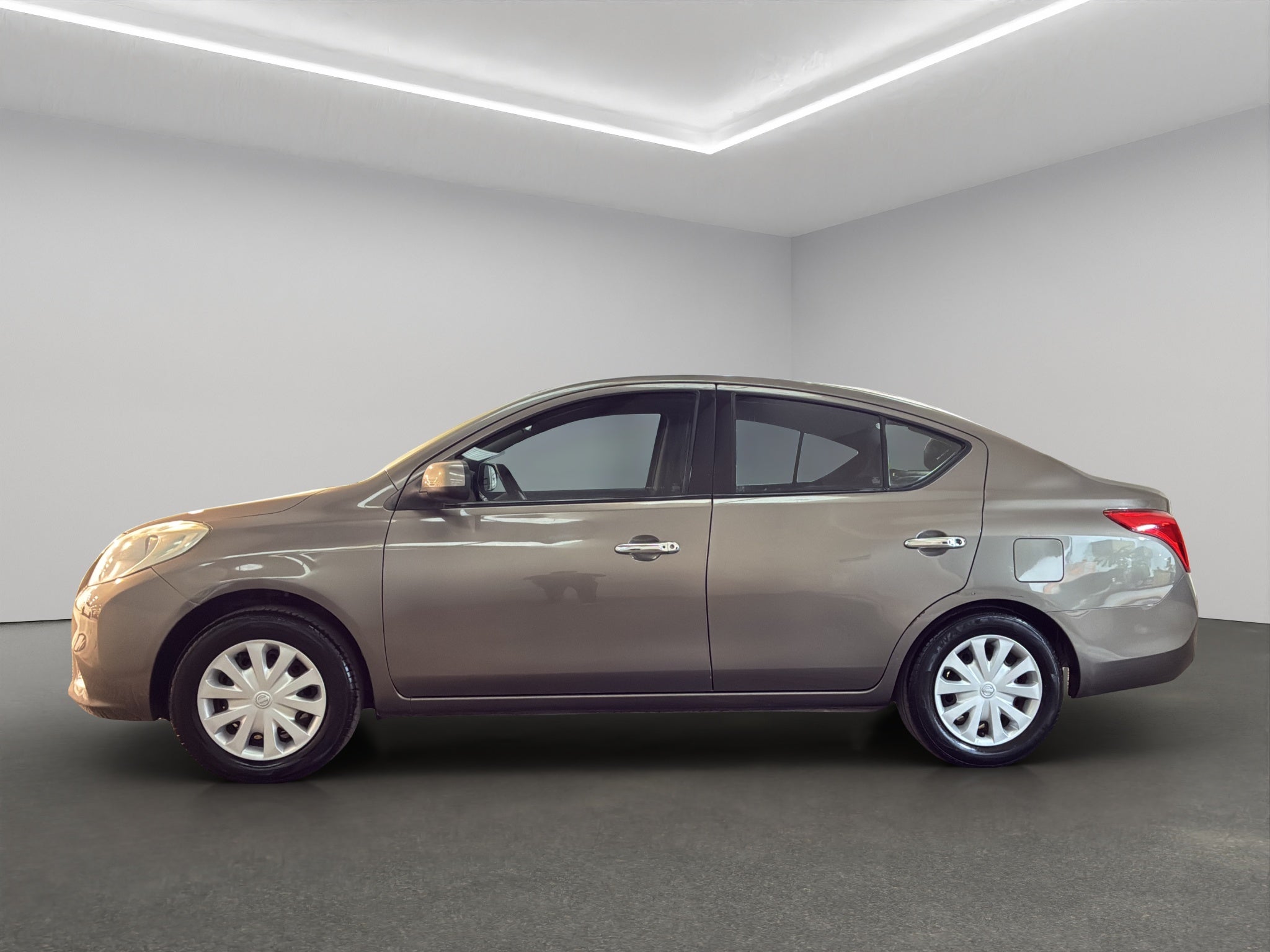 2015 Nissan Versa 4 pts. Sense, TM5, a/ac., VE