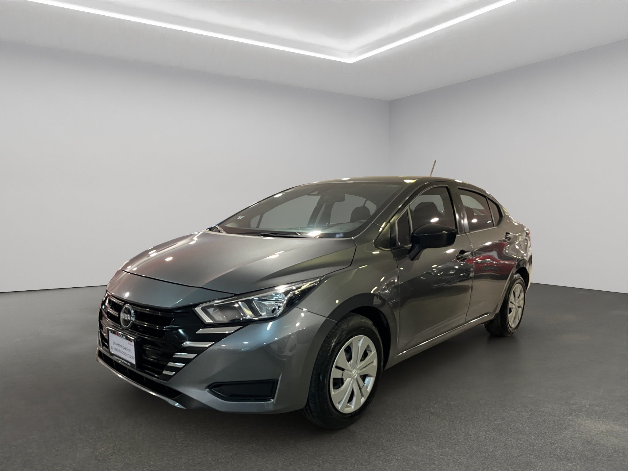 2024 Nissan Versa 4 pts. Sense, TM5, a/ac., R-15