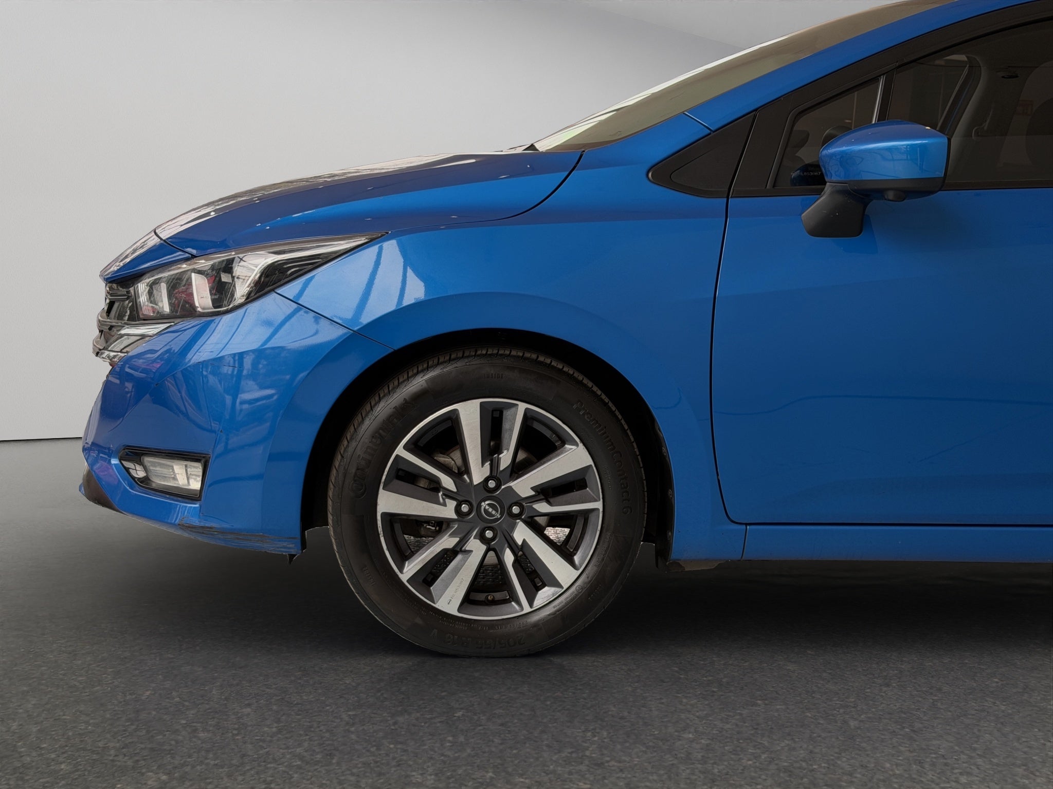 2024 Nissan Versa 4 pts. Sense, TM5, a/ac., R-15