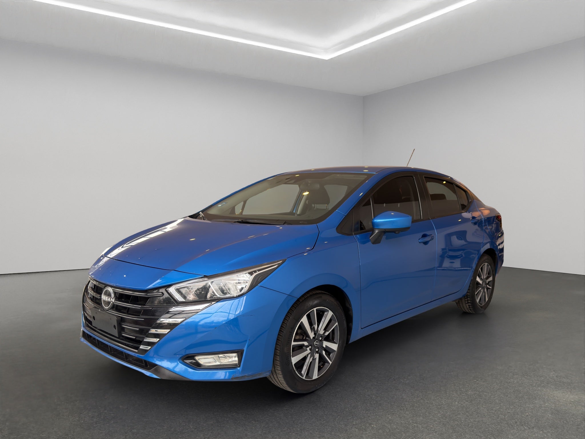 2024 Nissan Versa 4 pts. Sense, TM5, a/ac., R-15