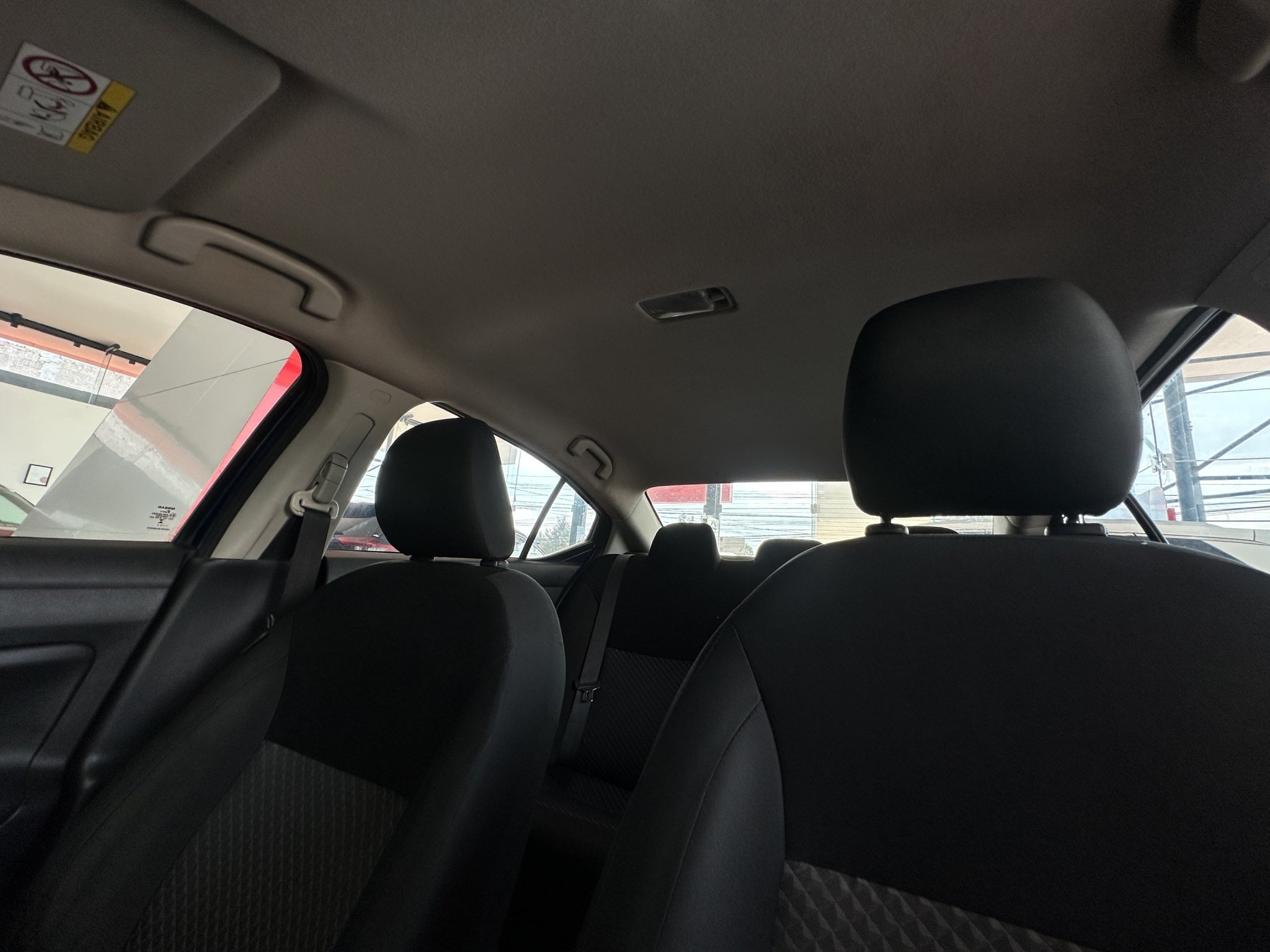 2024 Nissan Versa 4 pts. Sense, TM5, a/ac., R-15